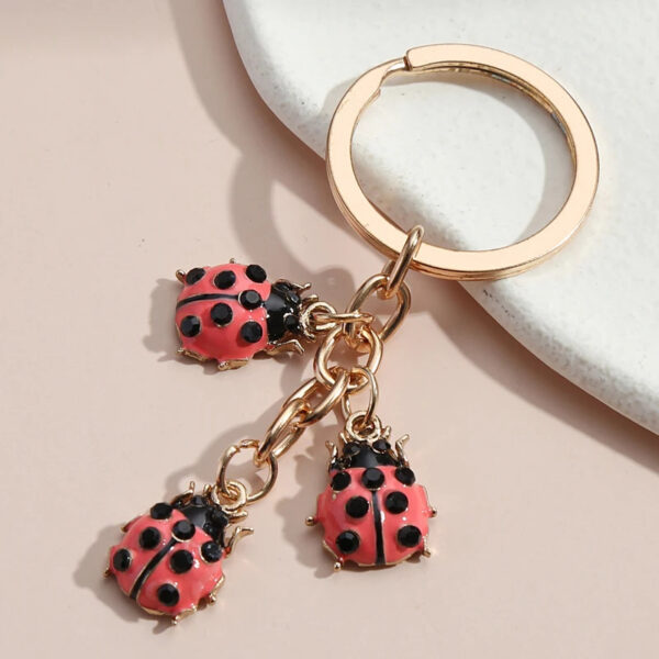 oly-1555435d1ff7180d8e53c93bef253e52 Wholesale Cartoon Insect Keychain Creative Oil Dripping Coccinella septempunctata Keychain Bag Pendant Cute Key Chain