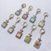 Wholesale Diamond-Encrusted Perfume Bottle Accessory Temu Gift Car Key Amazon Cross-Border Metal Keychain Key Pendant for Festivals