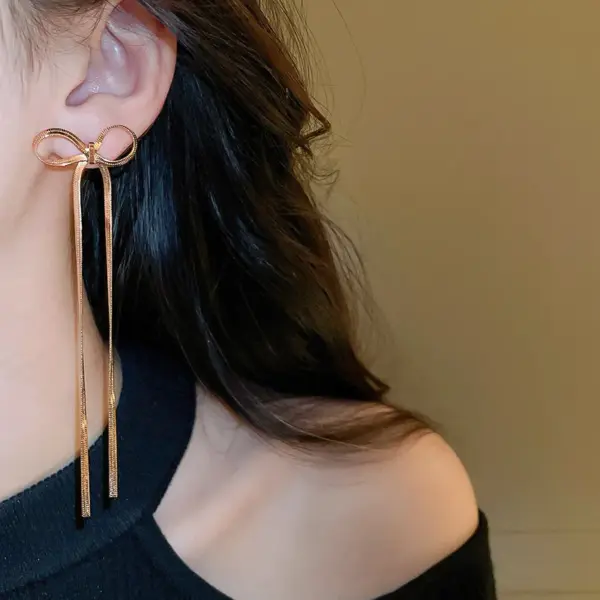 Wholesale 1 Pair Simple Style Bow Knot Plating Copper 18K Gold Plated Drop Earrings