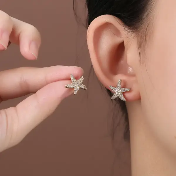 Wholesale 1 Pair Elegant Lady Star Heart Shape Butterfly Plating Inlay Copper Artificial Diamond Ear Studs