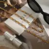 Wholesale Modern Minimalist Ladies Bracelet And Necklace Set 18K Gold Stainless Steel Gold And Silver Splicing Cross Buckle Hip Hop Design