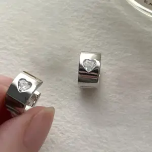 a Pair of Silver Ear Rings