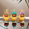Wholesale Yellow Duck Car Ornaments Helmet Bamboo Dragonfly Middle Finger Duck Car Interior Breaking Duck Car Creative Decorations