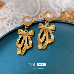 Silver Needle Pearl bow earrings