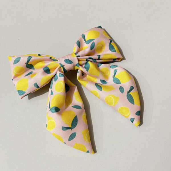 oly-1736f93c47a75f3e948678f1f24f13d9 Wholesale Fabric lemon knotted bow hair clip