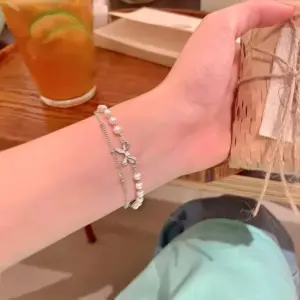 S598 Silver-Double-Layer Pearl Bow Bracelet