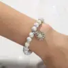 Wholesale Hip-hop Lotus Alloy Beaded Luminous Inlay Zircon Bracelets