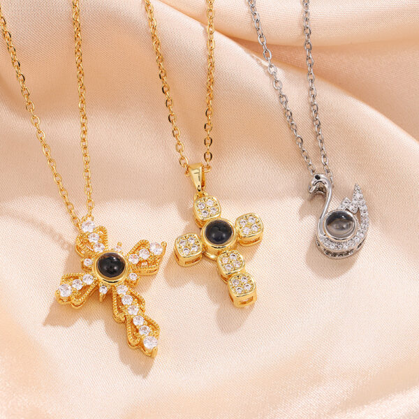 Wholesale Amazon Light Luxury Swan Necklace Design Sense Hundred Languages Projection Necklace European and American Elegant O-Word Titanium Steel Necklace