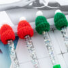 Wholesale Christmas ballpoint pen with colorful glitter and ink-filled design, Christmas hat pen