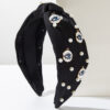 Wholesale Korean style elegant fabric headband studded with pearls, round evil eye design, fashionable wide-brimmed knotted hair accessory for women.
