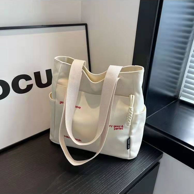 Wholesale Canvas bag for women ins Mori all-match shoulder bag large capacity book loading student class commuter bag rtable cloth bag
