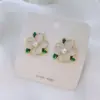 1 Pair Fairy Style Sweet Leaf Flower Spray Paint Inlay Imitation Pearl Alloy Cat's Eye Stone Zircon Earrings