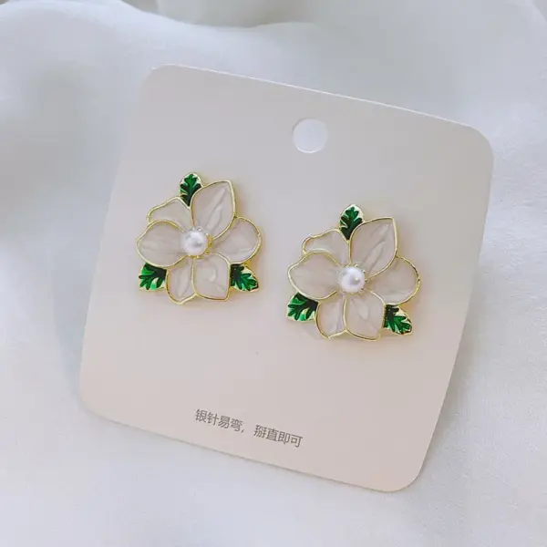 1 Pair Fairy Style Sweet Leaf Flower Spray Paint Inlay Imitation Pearl Alloy Cat's Eye Stone Zircon Earrings