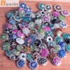 Wholesale Yiwu jewelry foreign trade explosions button diy jewelry accessories bracelet pendant earrings accessories wholesale manufacturers Four