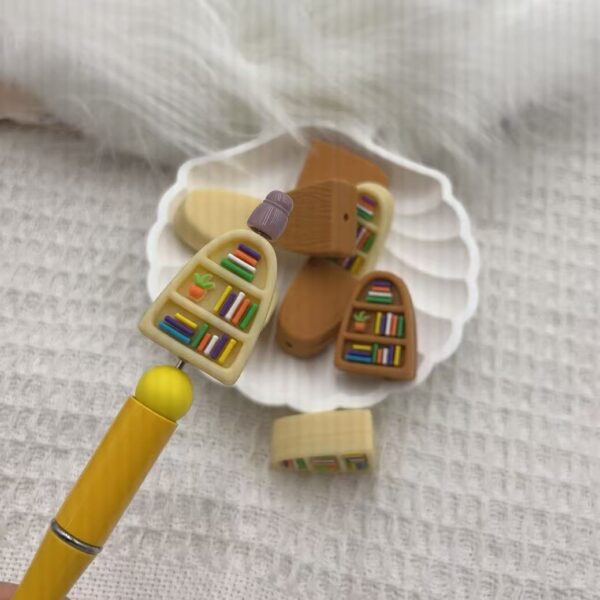 oly-1a05402145a4f92c945dc01281db3938 Wholesale Cross border silicone creative beads bookshelf beaded loose beads factory wholesale in stock