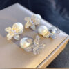oly-1a1fce2458dbbac0fd08e6af2ad37b66 Wholesale High-End Design Crystal Petal Earrings Trendy Korean Elegant Pearl Earrings for Women