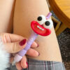 oly-1a267530a0dc229498ad9d10db160d59 Wholesale Cute big-mouthed, big-eyed funny doll black click gel pen