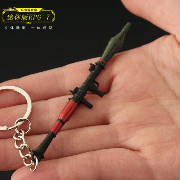 oly-1a42938eaa8ec8a6c8b8ef78cd4b5e91 Wholesale Heping elite peripheral metal chicken pendant RPG mini rocket launcher alloy keychain 9cm