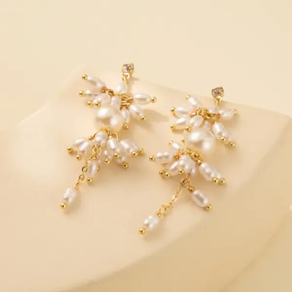 Wholesale 1 Pair Casual Cute Simple Style Asymmetrical Imitation Pearl Copper Drop Earrings