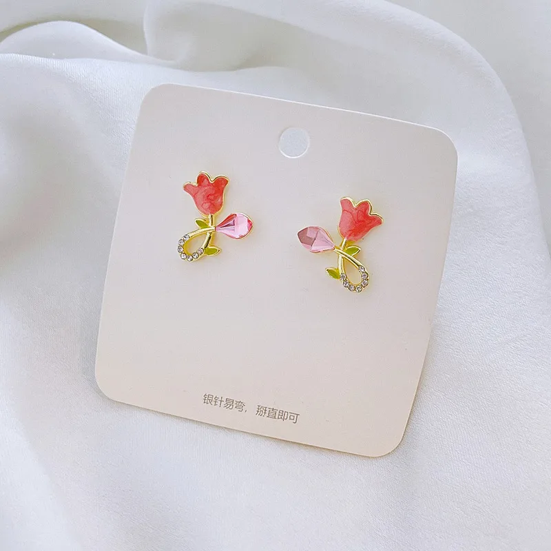 Wholesale 1 Pair Fairy Style Sweet Leaf Flower Spray Paint Inlay Imitation Pearl Alloy Cat's Eye Stone Zircon Earrings