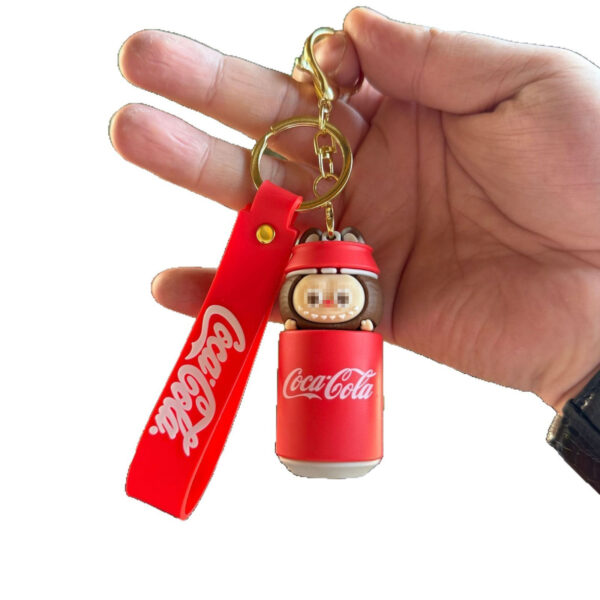 oly-1b526193bdbfa55cb5ab14dd5d9b09fa Wholesale Cross-Border Popular Coke Tooth Labubu Keychain Cartoon Couple Doll Pendant Bag Pendant
