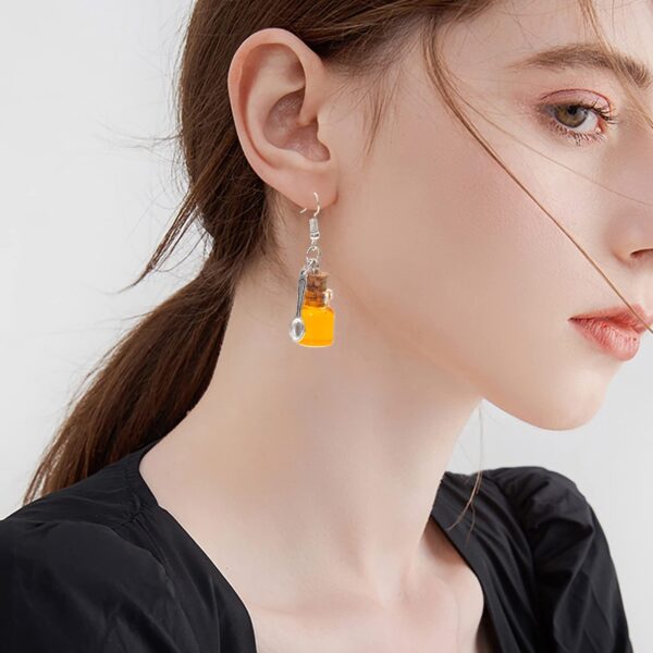 oly-1be9c0bae8840500256e41ac4b0aeabe Wholesale Cross-border new buzzing bee earrings Japanese and Korean fashion creative simulation honey transparent bottle earrings