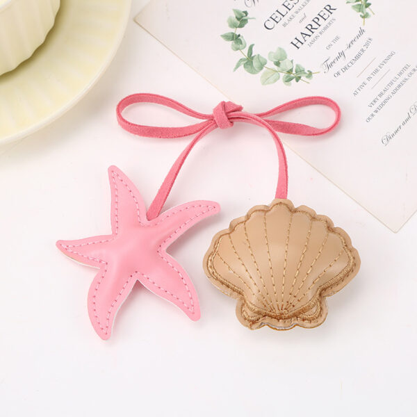 oly-1bf664f74810dd77323d5235e0ce93c4 Wholesale New cartoon starfish shell bag pendant accessories