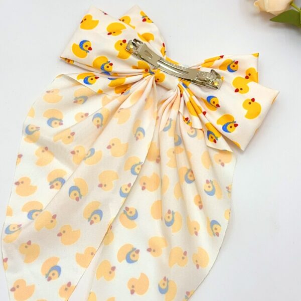 oly-1d17e6cb932c4d14133005b35dc68aca Wholesale Cartoon Little Yellow Duck Print Double-Layer Bow Spring Clip Long Ribbon Hairpin Back of the Head Top Clip Cute Hair Accessory