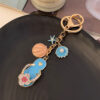 Wholesale Cute diamond-encrusted slippers car keychain metal bag pendant key chain gift