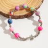 oly-1d710868fdb117672ebc0c060831b840 Wholesale Polymer clay with alloy cross beaded bracelet