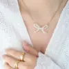 Wholesale PVD Coated Real Gold Plated Bow Knot Titanium Steel Elegant Waterproof Non Tarnish Necklace
