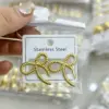 Wholesale 1 Pair/Package Casual Modern Style Simple Style Bow Knot Plating Hollow Out 304 Stainless Steel Ear Studs