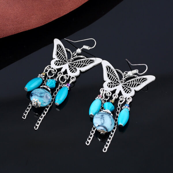 Wholesale European and American Retro Hollow Butterfly Tassel Earrings Fashion Jewelry Chain Tassel Personalized Earrings