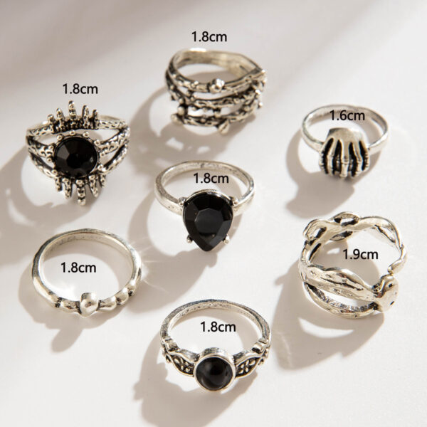 oly-1eb41f55a86e6ea80fa666b9e35270cb Wholesale Dark punk eye diamond ring seven-piece set