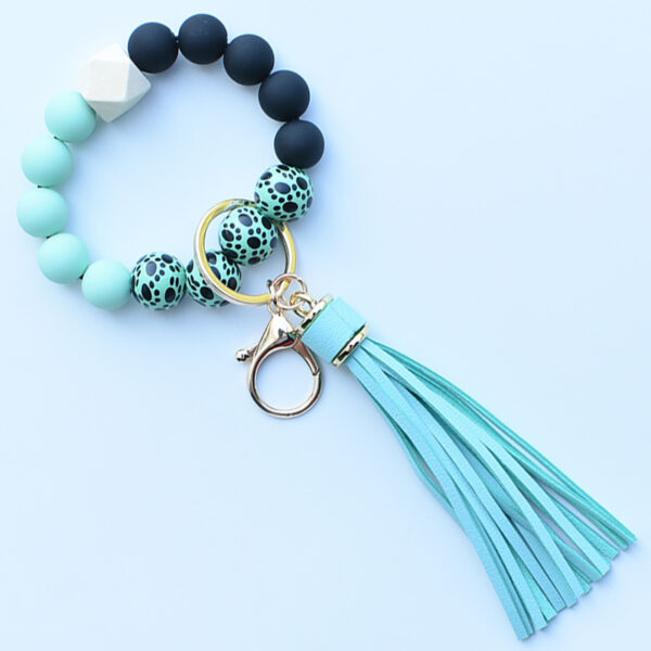 Wholesale Colorful leopard print silicone beaded bracelet keychain PU tassel pendant