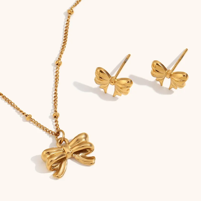 Wholesale PVD Coated Real Gold Plated 18K Gold Bow Knot 316L Stainless Steel Elegant Waterproof Non Tarnish Surgical Steel Earrings Necklace