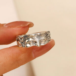 Ancient silver half face ring (alloy) X484