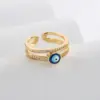Wholesale Fashion Copper Plating 18k Gold Zircon Dripping Devil's Eye Geometric Open Ring Female New
