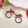 oly-21a1228e06e43bb122292441243f5703 Wholesale Christmas Bow Rice Bead White Crystal Garland Earrings