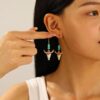 Wholesale European and American Niche Ethnic Style Personalized Niutou Earrings Women's Retro Western Denim Style Songshi Earrings Cross-border Jewelry