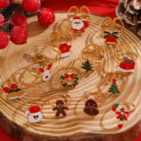 oly-2431e4c7464cb2f3cfa77be254fd0d05 Wholesale Christmas series stainless steel open ring with cartoon snowman design, festive ring