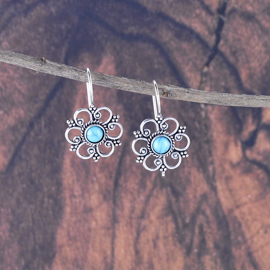 Wholesale Hollow petal inlaid turquoise op earrings