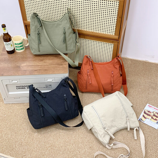 oly-24e83dddf138228488ae07df530345ed Wholesale Large-Capacity Nylon Cloth Bag Crossbody Bag for Women Korean Style Lazy Style Shoulder Bag Design Niche Commuter Bag