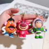 Wholesale 50 Toy Story Doll Keychain Three-eyed Buass Lightyear Strawberry Bear Bag Hanging Doll Machine