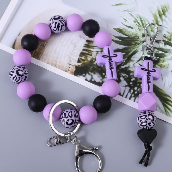 oly-25fd072287ed0827da36c152d6ac4be7 Wholesale Cross Silicone Leopard Print Wooden Bead Keychain