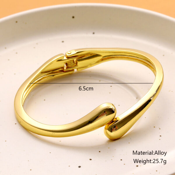 Wholesale Cross-border European and American Fashion Water Drop Streamline Exaggerated Bracelet Metallic Glazed Face Hug Spring Opening Bracelet