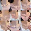 Wholesale Titanium Steel Fashion Plating Four Leaf Clover Heart Shape Artificial Pearls Zircon Pendant Necklace