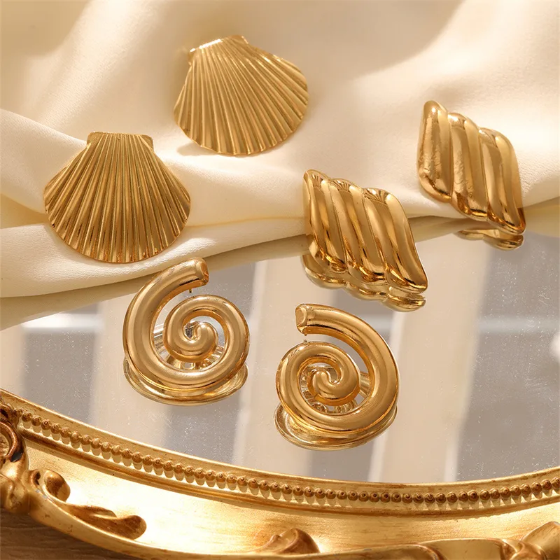 Wholesale 1 Pair Casual Simple Style Wings Spiral Shell Titanium Steel 18K Gold Plated Ear Studs