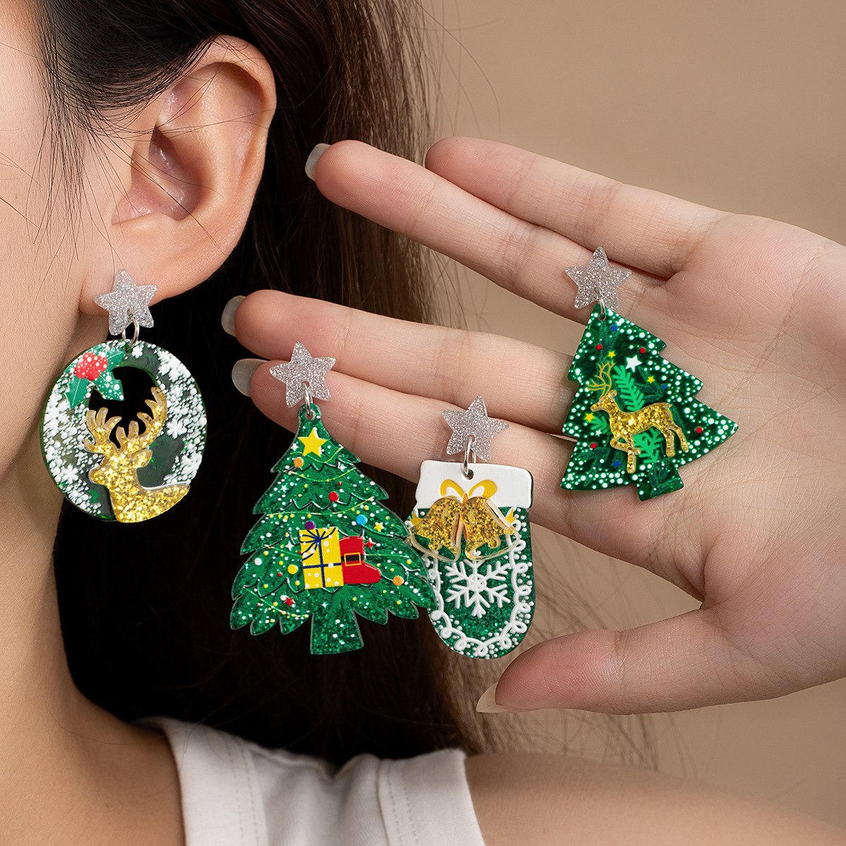 Wholesale Acrylic earrings for Christmas and New Year, including reindeer, Christmas tree, snowflakes, and five-inted stars.