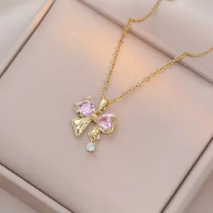 X2944 Gold Pink Bow Zircon